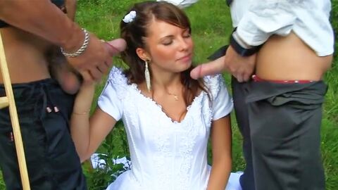Wearing her wedding dress while having a group party