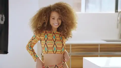 Nubile dark-hued with wavy hair is railing a massive fuck-stick on the sofa