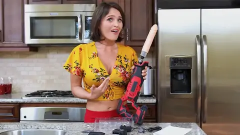 Prepping to pulverize the dark-haired honey with a machine